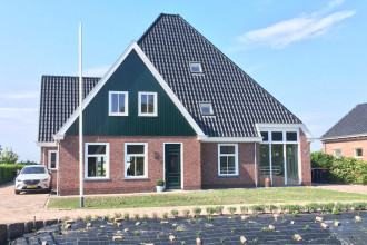 Nieuwbouw dubbele stopboerderij te Hauwert